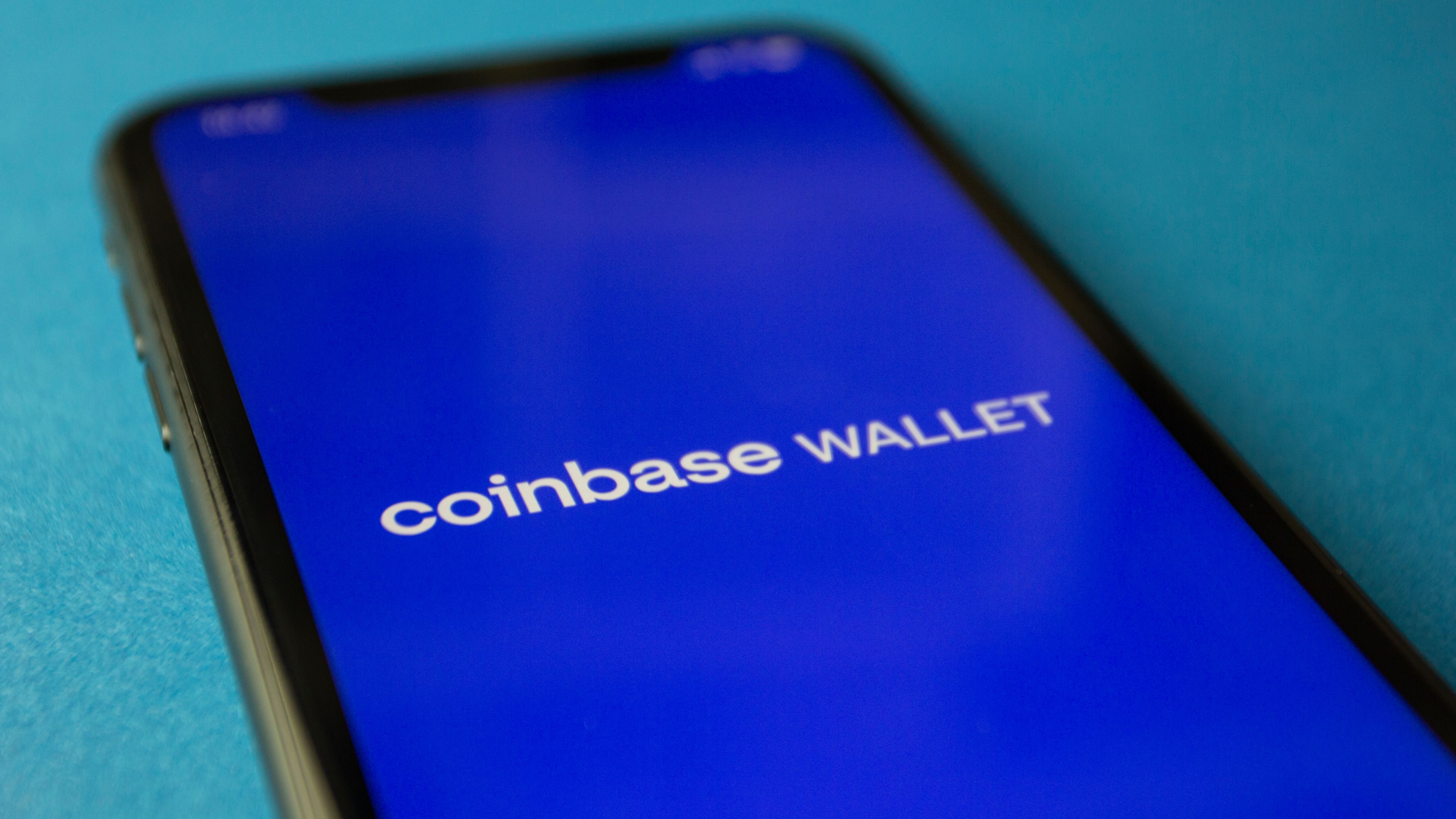 Close-up of a smartphone showing a cryptocurrency wallet app interface for transactions
